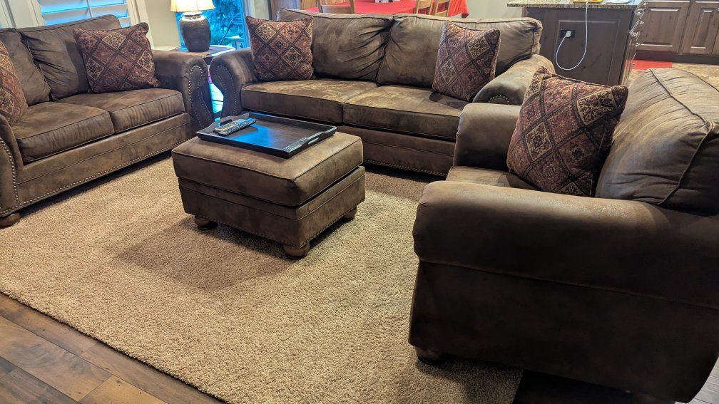 Brown Microfiber Sofa set with Nailhead Trim and 5 Patterned Pillows