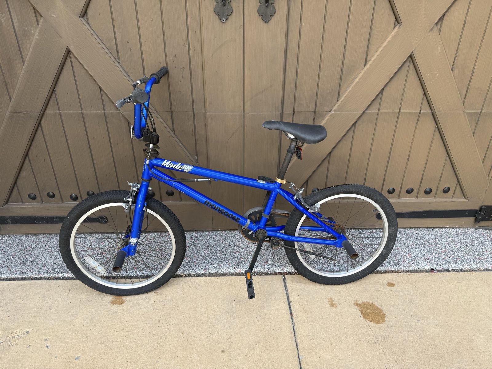 Mongoose Mode 100 BMX Bike - Blue, 20-inch Wheels, Freestyle Ready