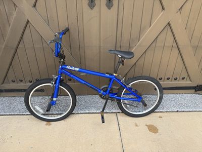Mongoose Mode 100 BMX Bike - Blue, 20-inch Wheels, Freestyle Ready