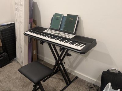 Brand New Yamaha Keyboard w/stand & bench