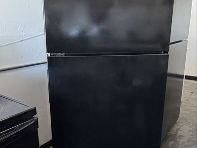 Whirlpool Top Freezer Refrigerator in Black - Used Good Condition