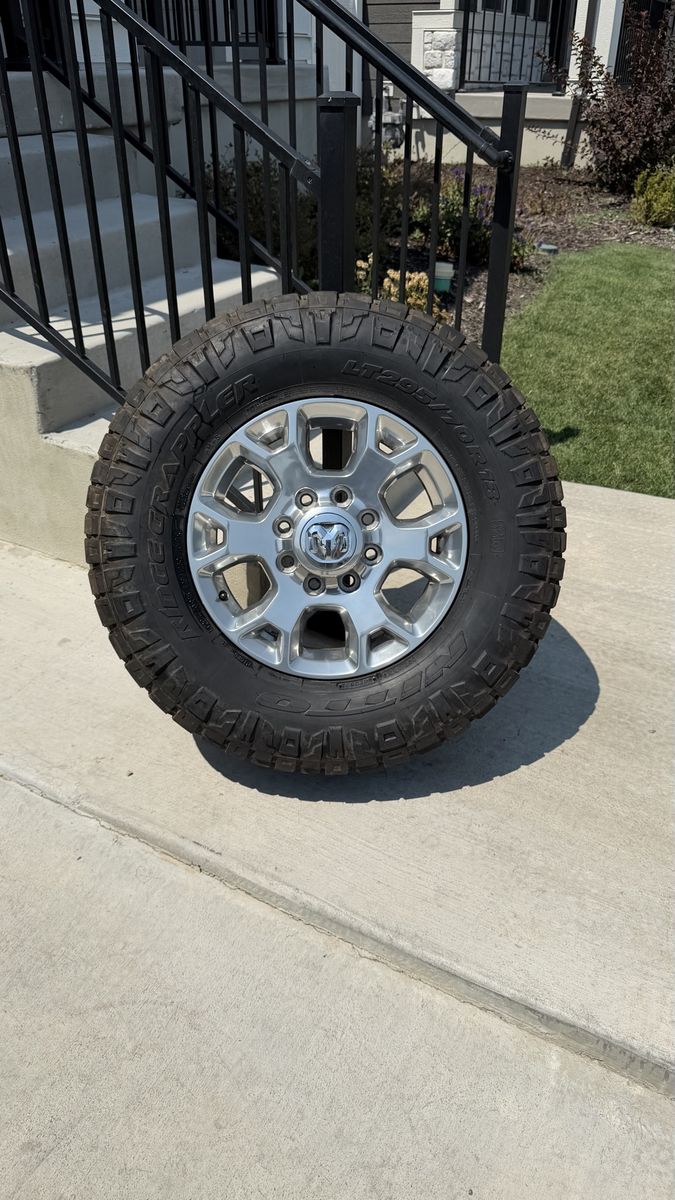 Dodge Ram 3500 Rims and Tires 295/70R18 Nitto Ridge Grappler Load E 