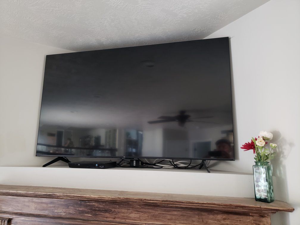 TCL 65" Smart TV 1 yr old with Google TV Excellent Condition