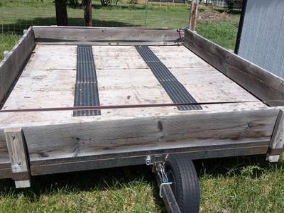 Utility Trailer with Wooden Stake Sides and Metal Frame