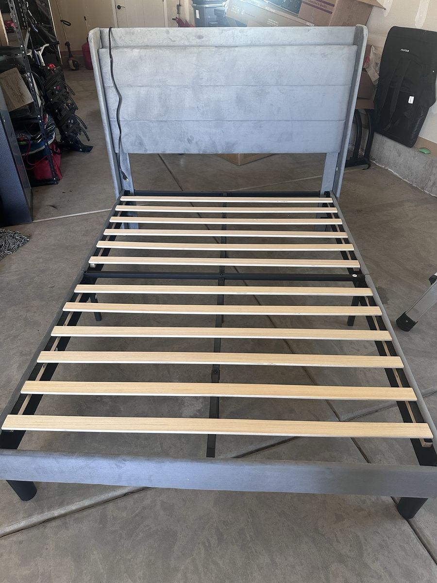 Full size upholstered bed frame with outlets