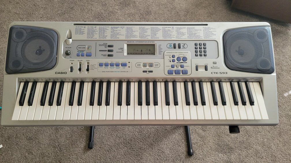 Casio Keyboard piano with stand & mic