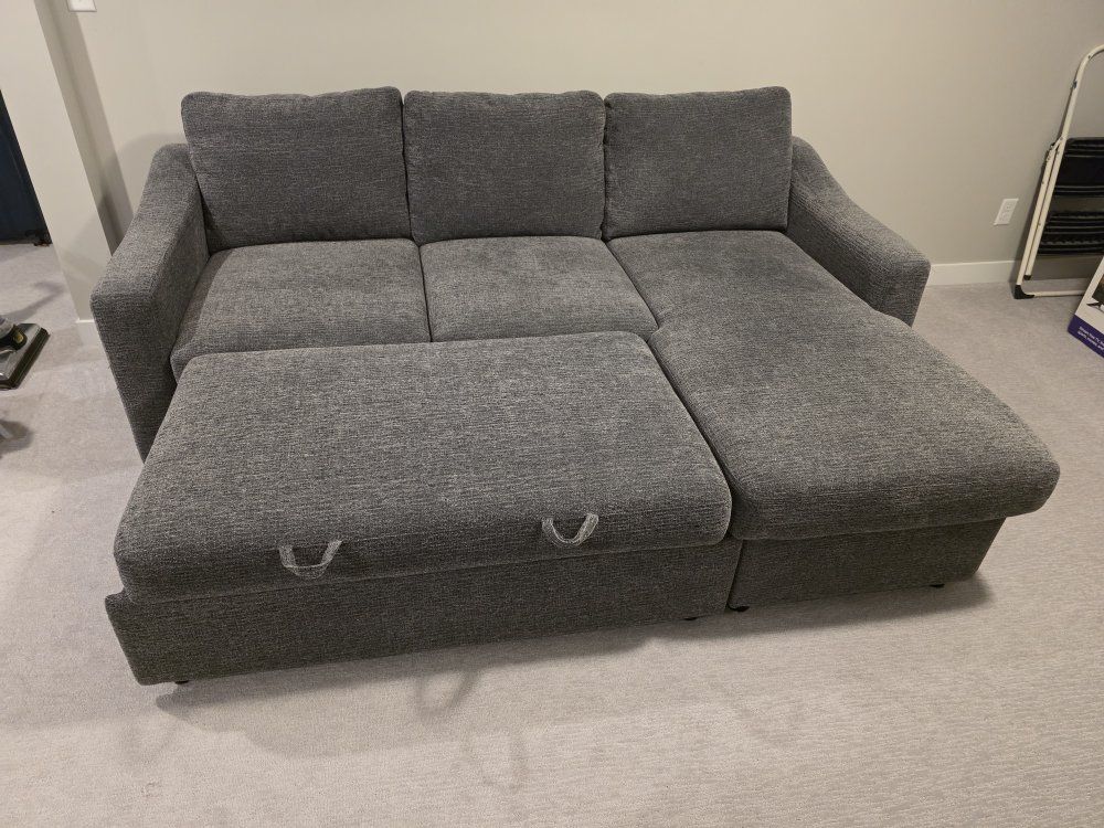 Reversible storage chaise with pull-out bed