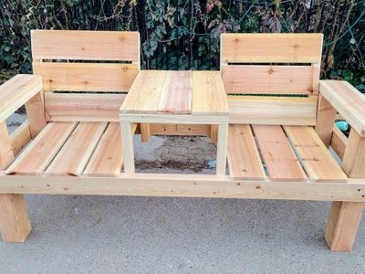 Outdoor wood bench seating with table