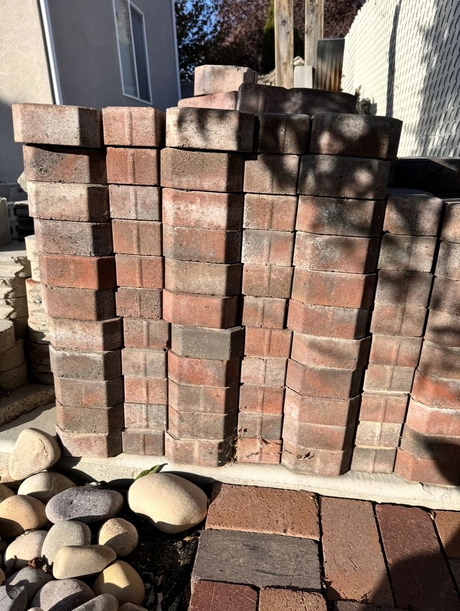 Stack of Interlocking Concrete Paver Bricks - Red Blend