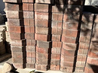Stack of Interlocking Concrete Paver Bricks - Red Blend
