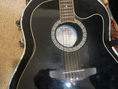 Ovation Acoustic-Electric Guitar, Black, with Hard Case, Carry Strap, And Strings