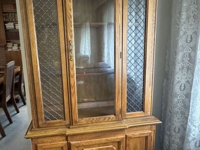 Ornate Wooden Display Cabinet with Glass Doors & Storage