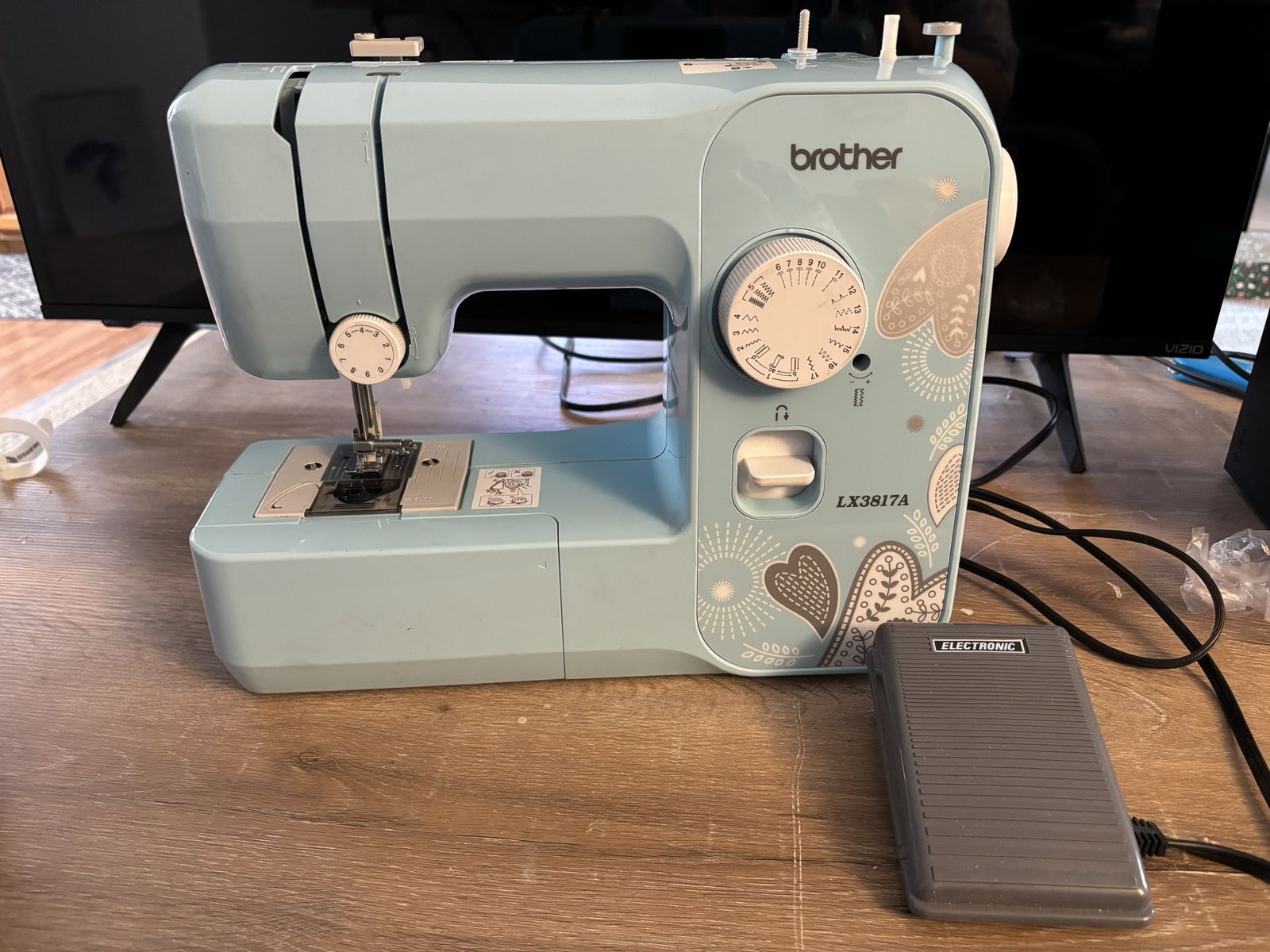 Brother LX3817A 17-Stitch Light Blue Electronic Sewing Machine with Foot Pedal