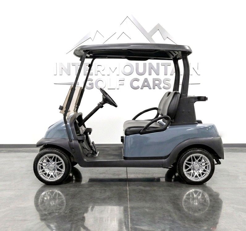 Beautifully refurbished pearl mist gray Club Car Precedent golf cart with new Trojan batteries and custom mag wheels