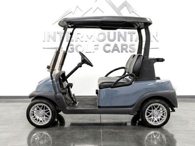 Beautifully refurbished pearl mist gray Club Car Precedent golf cart with new Trojan batteries and custom mag wheels