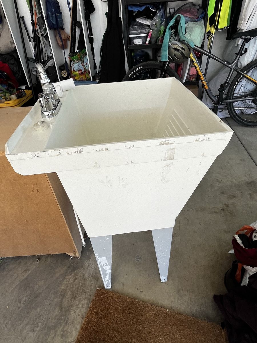Utilatub 17f 23” with faucets, hoses, and drain pipe