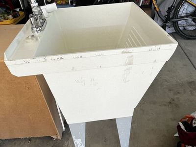 Utilatub 17f 23” with faucets, hoses, and drain pipe