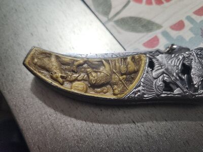 engraved knife wolf's and Indians