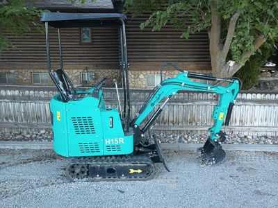H15R Compact Mini Excavator - Teal Industrial Digger