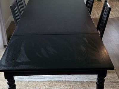 Table with leaf and 4 chairs