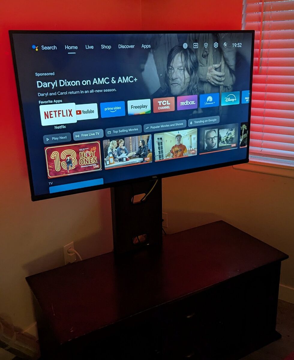 TCL 55" SMART TV w/ ENTERTAINMENT CENTER.