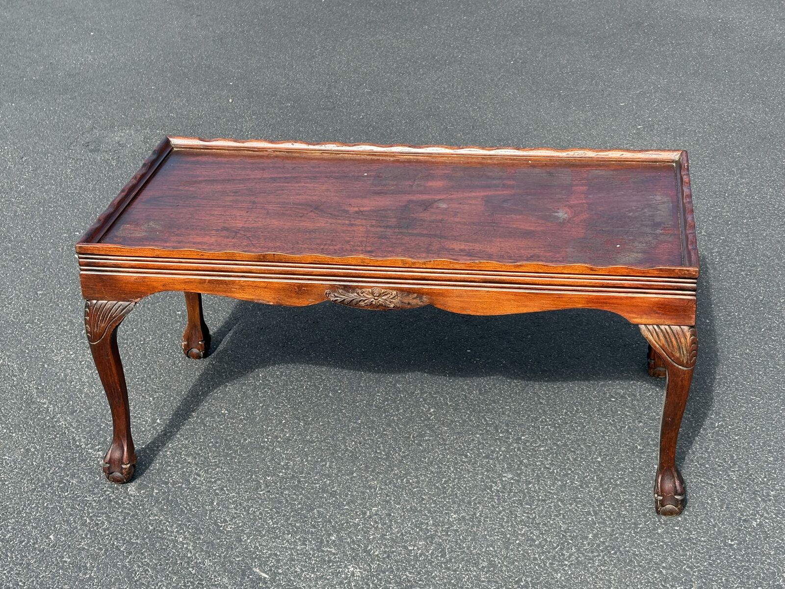 Antique coffee table chippendale style, solid mahogany wood coffee table. Ball and claw feet vintage cocktail table