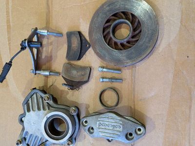 Arctic cat m8 caliper and rotor assembly.