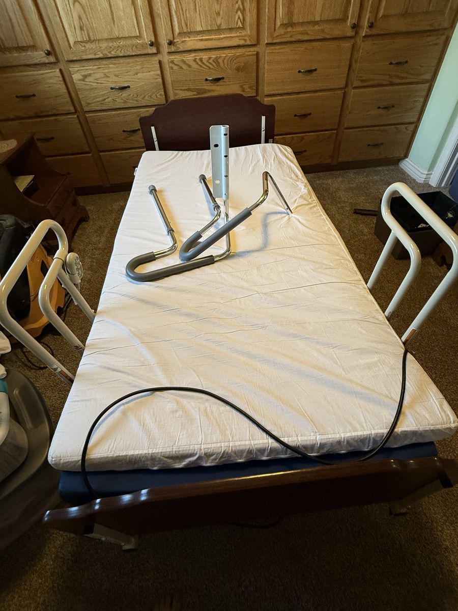 Invacare Carroll CS Series Electric Hospital Bed with Assist Rails - Minimal Use