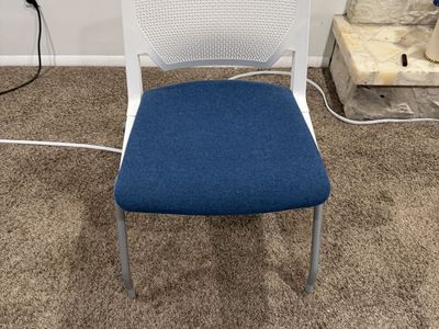 White Frame Chair with Blue Fabric Seat and Mesh Back - Modern Style