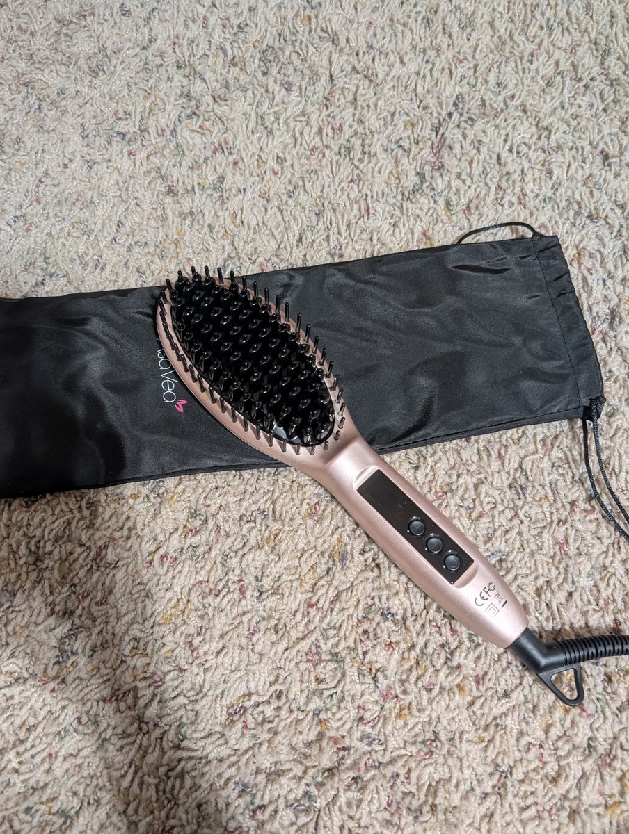 Heated straightening brush