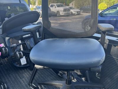 5 blue/black office chairs