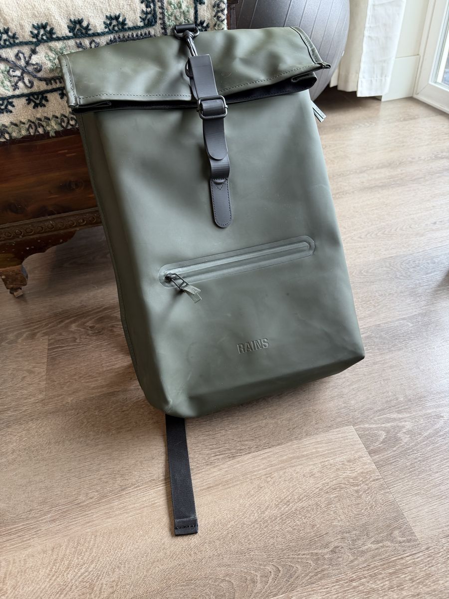 RAINS Green Rolltop Water-Resistant Backpack - Sleek & Durable
