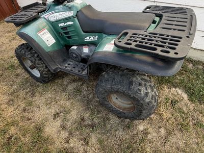 Polaris magnum 325 4x4 with snow plow