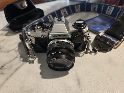 Olympus OM-10 35mm SLR Film Camera W/Instructions
