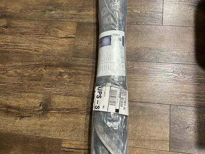 4' X 4' Round Rug (never opened)