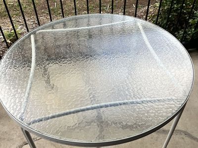 Outdoor glass table