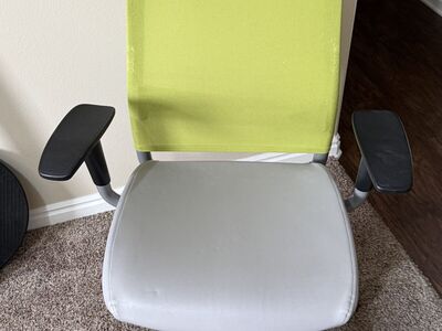 2 Adjustable, swival office chairs.