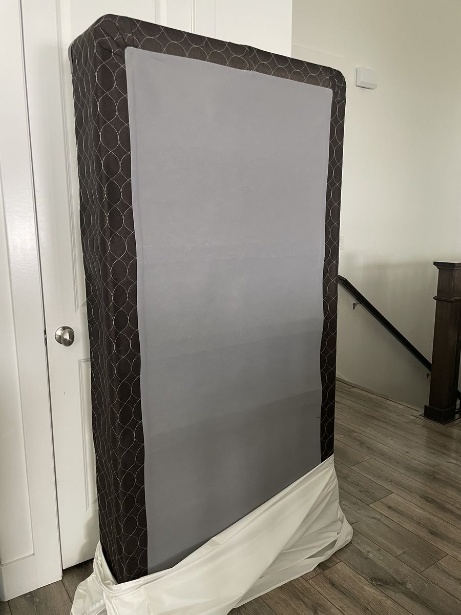 Clean TWIN 9" FOUNDATION (like box springs). Has been in zippered encasement.