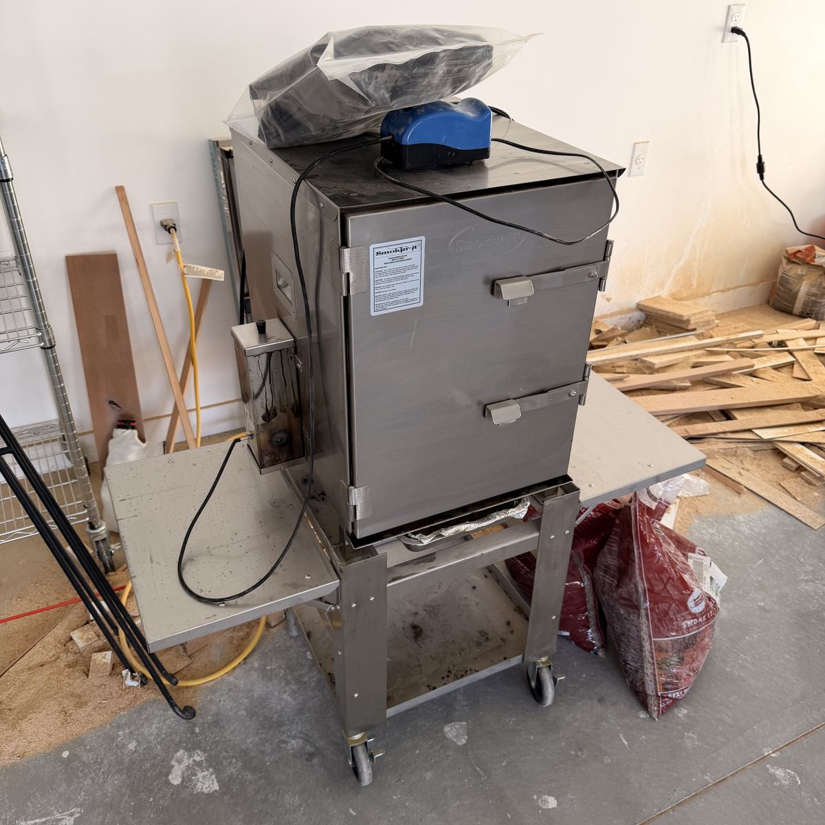 Smokin-It Model #2 electric smoker with stainless cart, cover, air pump, and wood pellets
