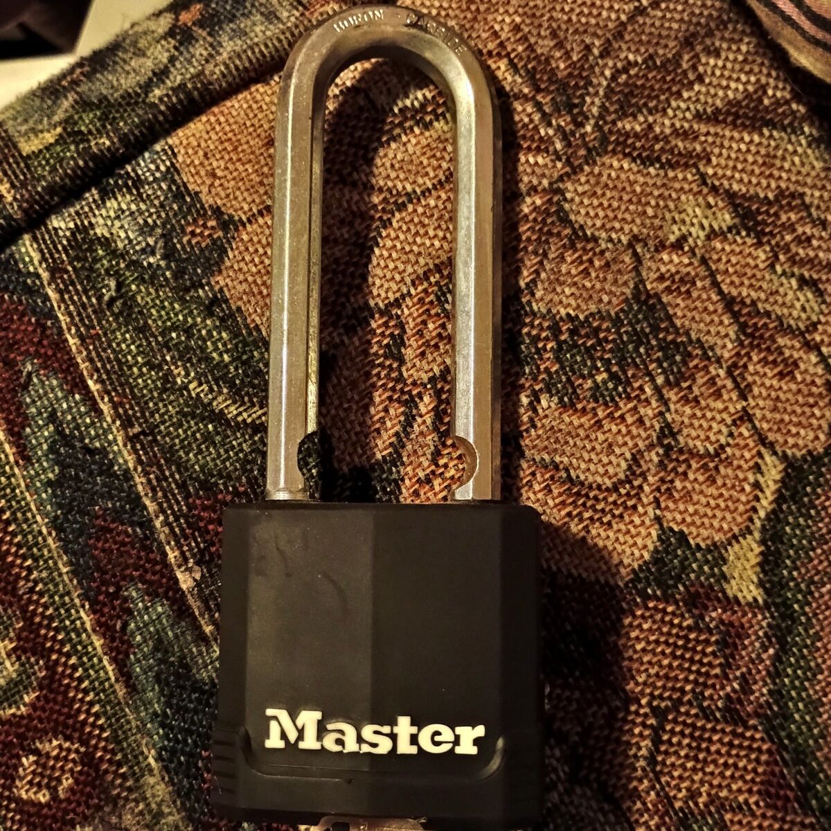 Master Lock Magnum heavy duty padlock with key