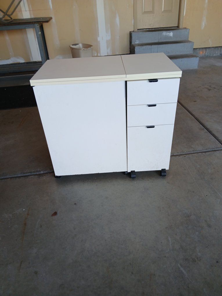 sewing machine cabinet and work station