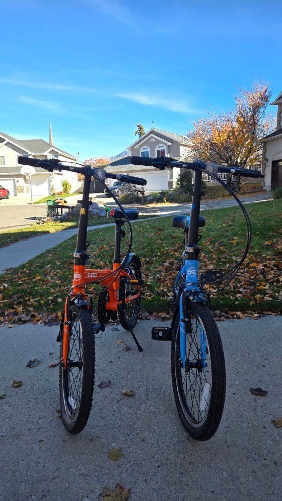 Zizzo Via 20" Folding Bikes - Orange & Blue Pair, 7-Speed Commuter