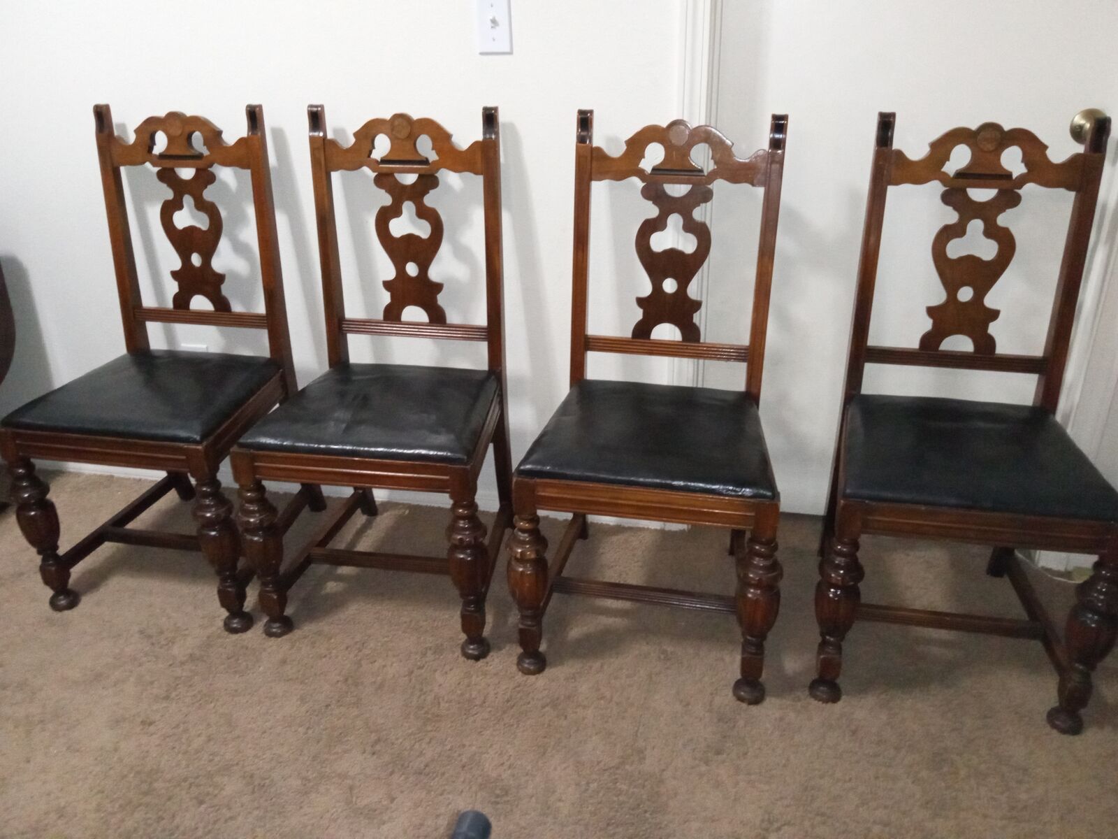 Antique dining chairs with pierced splat back and leather seats (set of four)