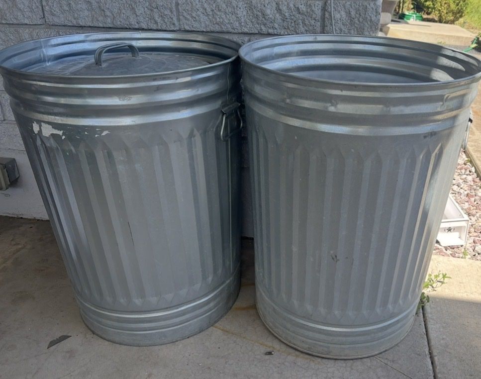 2 Metal trash cans