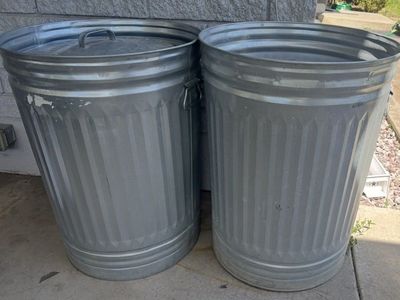 2 Metal trash cans