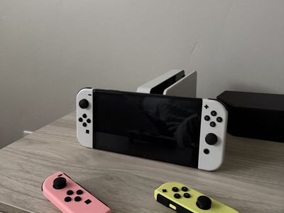 Nintendo Switch OLED Model with Dock and Extra Joy-Cons
