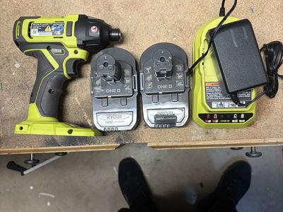New Ryobi 1/4 Impact Driver With (2) 1.5 Bateries