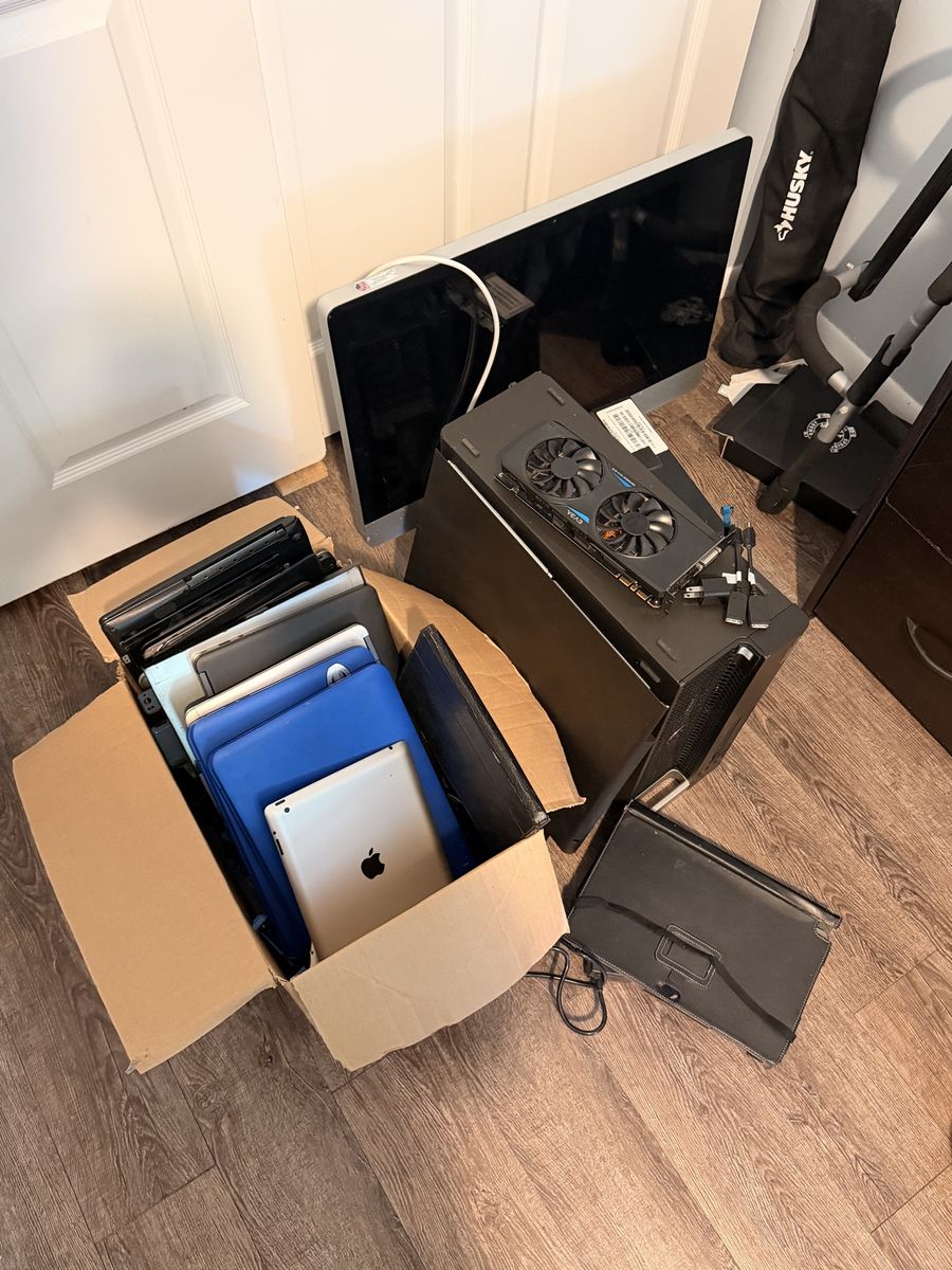 Lot of computers, desktops, laptops, iPad etc