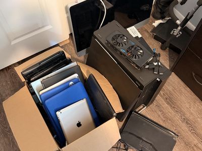 Lot of computers, desktops, laptops, iPad etc
