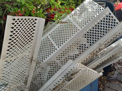 Rain gutter leaf guards